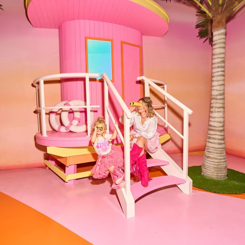 Pink staircase and interior of the life-sized Barbie DreamHouse