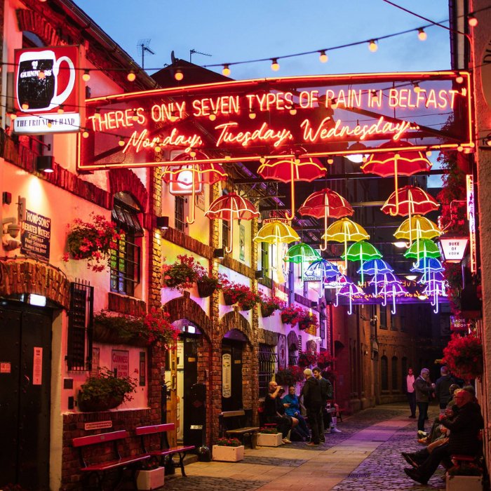 Colourful illuminated umbrellas above a lane in Belfast's Cathedral Quarter
