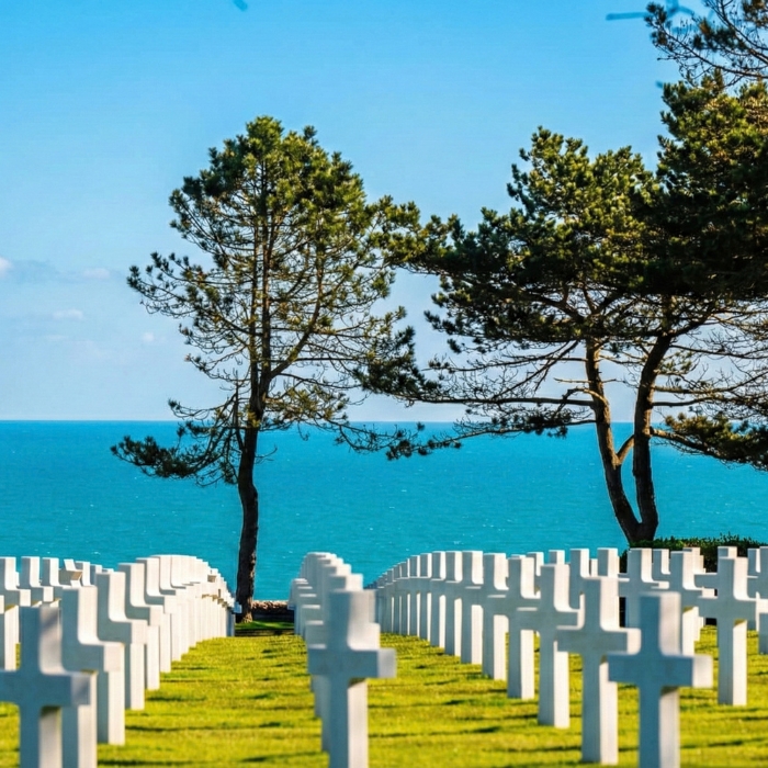White headstones overlooking the sea at Normandy American Cemetery