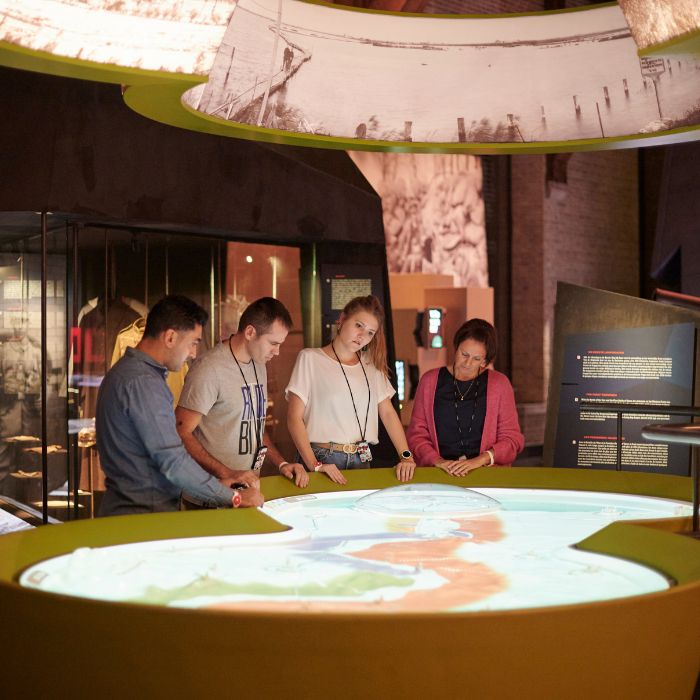 Visitors exploring a display at In Flanders Fields Museum