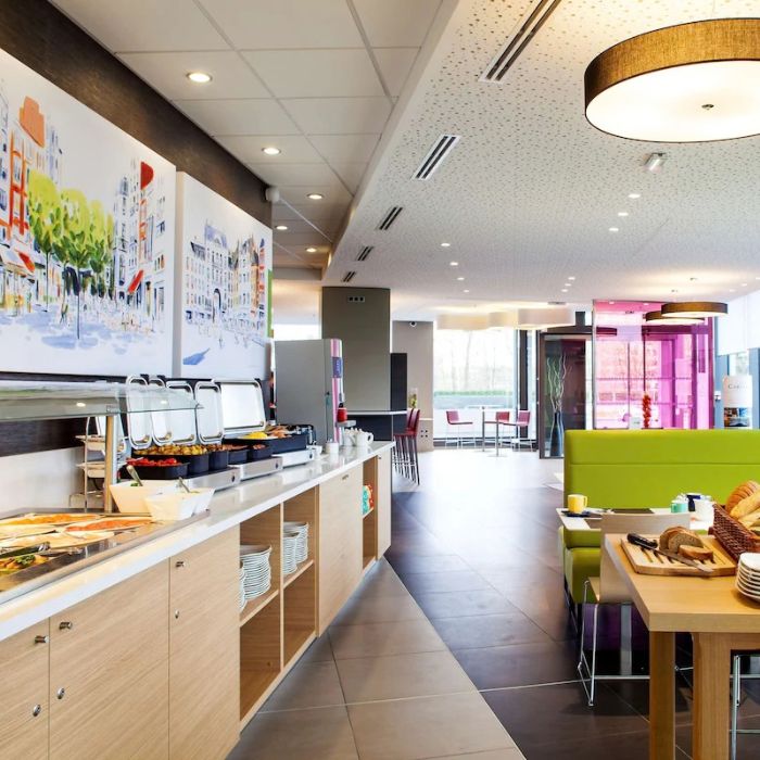 Breakfast dining area at Park Inn by Radisson Lille Grand Stade