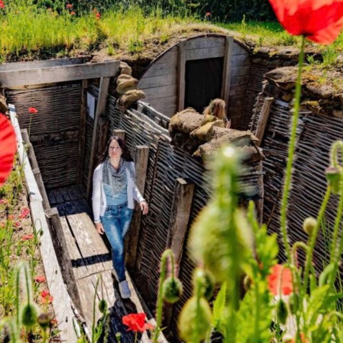 Visitors exploring the reconstructed trenches at Passchendaele Museum