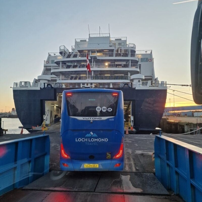 Loch Lomond Travel coach boarding a ferry
