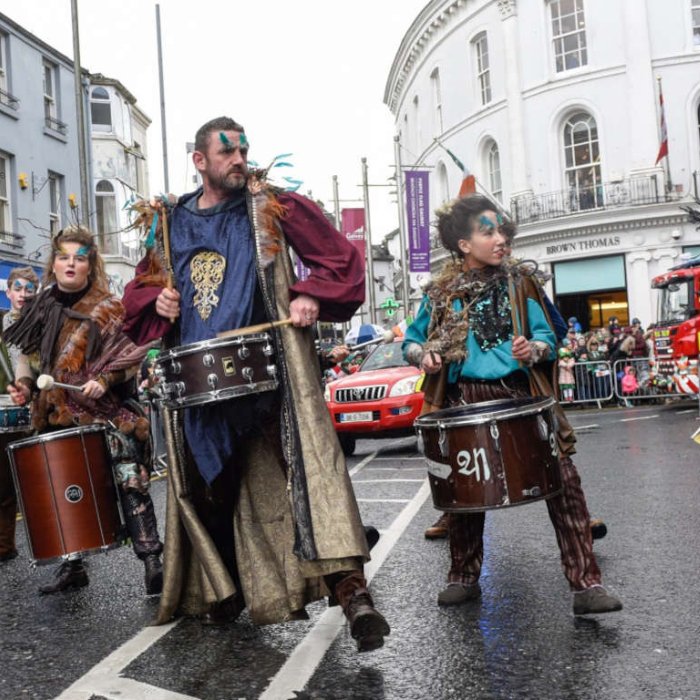 Costumed drummers performing on Galway’s streets during the parade
