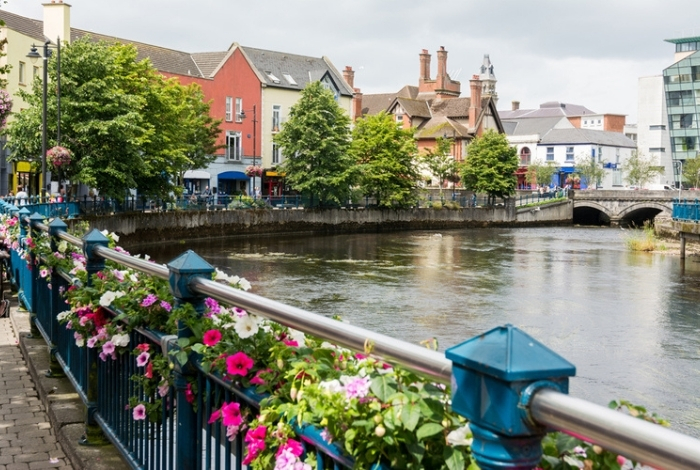 Colourful buildings beside a bridge over the river in Sligo
