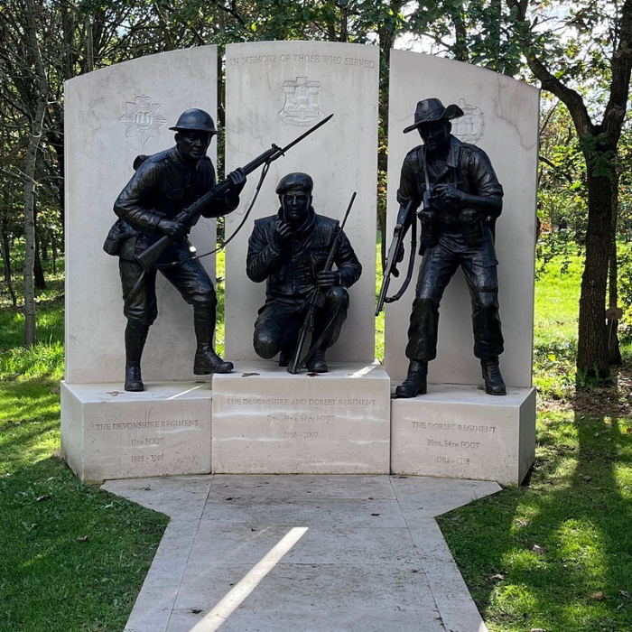 A sculptural memorial within the National Memorial Arboretum