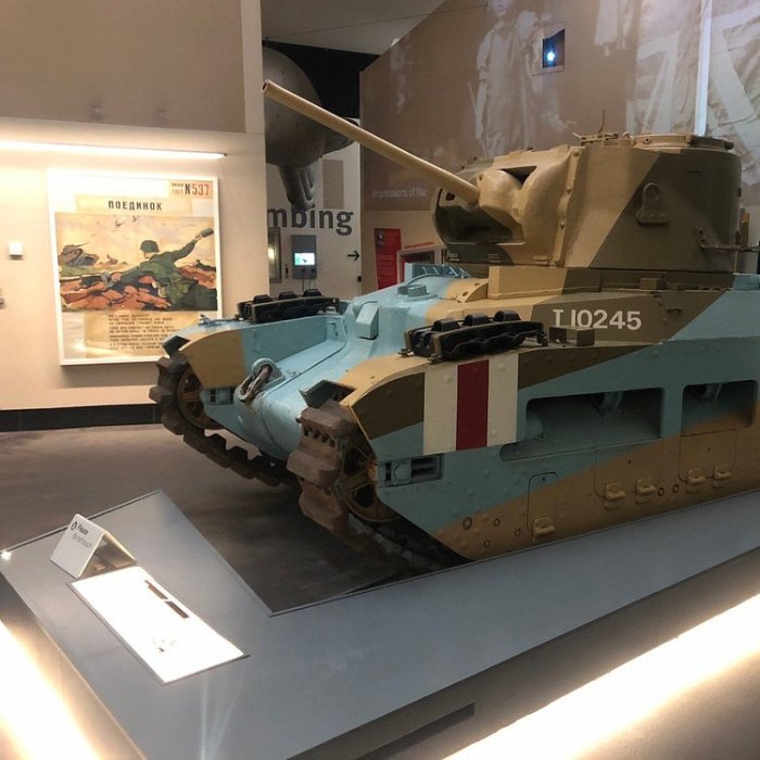 Military vehicle and exhibits inside Imperial War Museum North