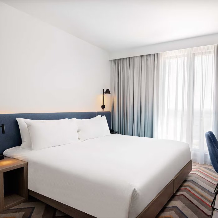 A bright modern bedroom at Hampton by Hilton High Wycombe