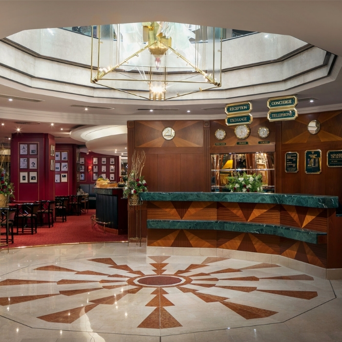 The elegant reception area at the Art Nouveau Palace Hotel