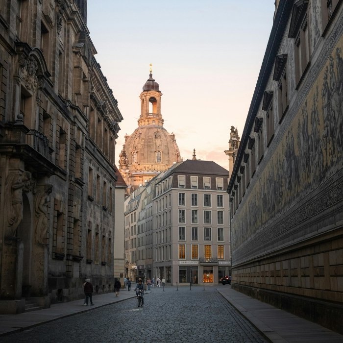A Dresden street framing the dome of the Frauenkirche